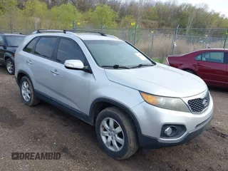 2012 Kia Sorento LX with VIN 5XYKT4A61CG215217, listed as a IAAI auction lot 42103645 with 200,758 mi miles. Bid and sale history available at carsss.com. Image 1.