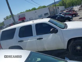 2010 Chevrolet Tahoe LS with VIN 1GNMCAE05AR263340, listed as a IAAI auction lot 41998453 with 256,944 mi miles and . Bid and sale history available at DreamBid. Image 13.