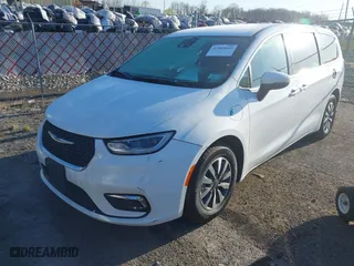 2023 Chrysler Pacifica Hybrid Touring L with VIN 2C4RC1L74PR562240, listed as a IAAI auction lot 42060669 with 45,882 mi miles. Bid and sale history available at carsss.com. Image 17.