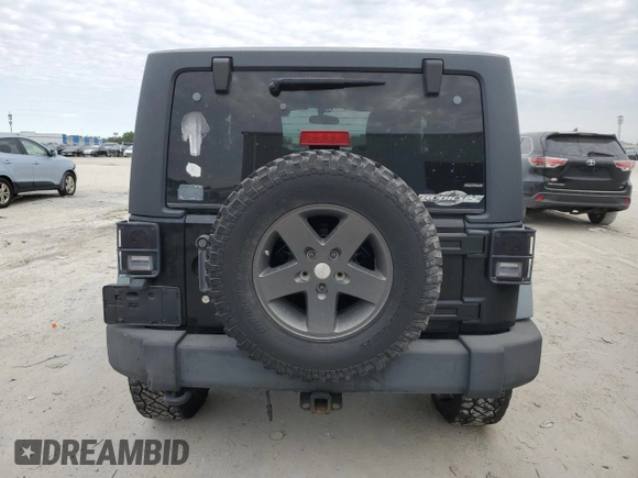 2011 Jeep Wrangler Rubicon with VIN 1J4BA6D15BL585388, listed as a Copart auction lot 76272184 with 119,043 mi miles and Clean title. Bid and sale history available at DreamBid. Image 6.