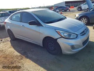 2015 Hyundai Accent GLS with VIN KMHCT4AE5FU808332, listed as a IAAI auction lot 42033625 with 195,433 mi miles. Bid and sale history available at carsss.com. Image 1.