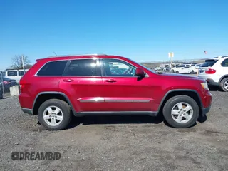 2012 Jeep Grand Cherokee Laredo with VIN 1C4RJFAG7CC297757, listed as a IAAI auction lot 41901645 with 270,731 mi miles. Bid and sale history available at carsss.com. Image 13.