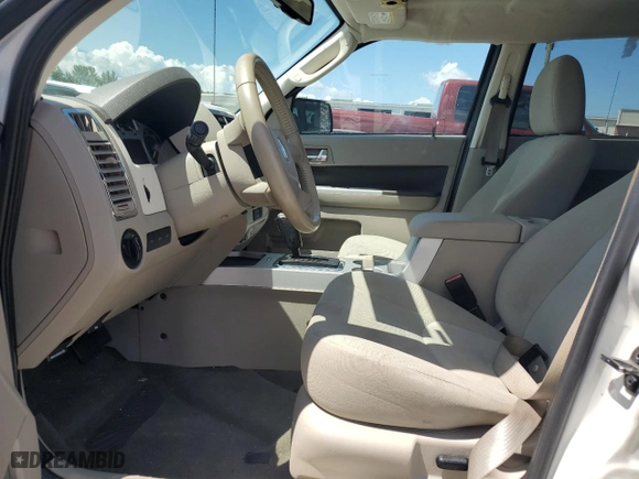2010 Mercury Mariner with VIN 4M2CN8B78AKJ00919, listed as a Copart auction lot 64988364 with 0 mi miles and Salvage Title. Bid and sale history available at carsss.com. Image 7.
