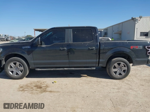 2018 Ford F-150 XL with VIN 1FTEW1E50JKE13640, listed as a IAAI auction lot 41228537 with 146,927 mi miles. Bid and sale history available at carsss.com. Image 14.