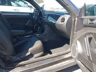 2014 Volkswagen Beetle 1.8T z VIN 3VWJ17AT9EM664866, wystawiony jako IAAI lot #42157223 z przebiegiem 36 381 mil mil oraz . Historia ofert i sprzedaży dostępna na DreamBid. Obrazek 5.