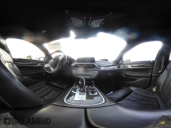 2019 BMW 7 Series 750i xDrive with VIN WBA7F2C52KB240302, listed as a IAAI auction lot 40984933 with 93,737 mi miles and . Bid and sale history available at DreamBid. Image 18.