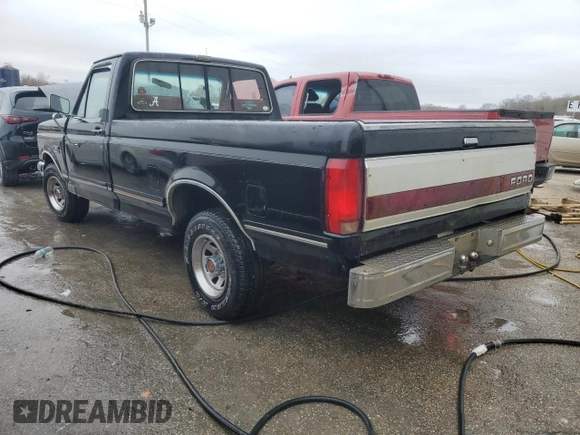 1991 Ford F-150 with VIN 1FTDF15Y2MNA23857, listed as a Copart auction lot 86339744 with 97,118 mi miles and Salvage Title. Bid and sale history available at carsss.com. Image 2.