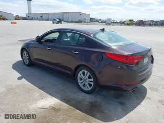 2011 Kia Optima EX with VIN KNAGN4A7XB5055304, listed as a IAAI auction lot 42023759 with 158,385 mi miles. Bid and sale history available at carsss.com. Image 3.