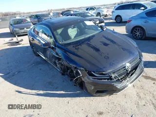 2020 Volkswagen Arteon SEL R-Line z VIN WVWSR7AN2LE015611, wystawiony jako IAAI lot #41417161 z przebiegiem 55 773 mil mil oraz . Historia ofert i sprzedaży dostępna na DreamBid. Obrazek 1.