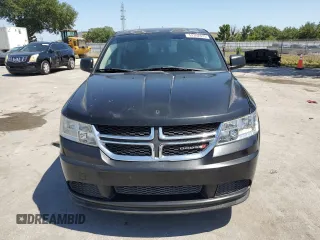 2013 Dodge Journey American Value with VIN 3C4PDCAB6DT709996, listed as a Copart auction lot 52362635 with 104,808 mi miles and Salvage Title. Bid and sale history available at DreamBid. Image 5.