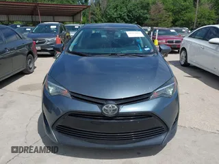 2018 Toyota Corolla L z VIN 5YFBURHE4JP820560, wystawiony jako IAAI lot #42317624 z przebiegiem 84 946 mil mil oraz . Historia ofert i sprzedaży dostępna na DreamBid. Obrazek 6.