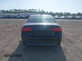 2015 Audi A6 3.0T Prestige with VIN WAUHGAFC3FN011654, listed as a IAAI auction lot 42104153 with 166,719 mi miles. Bid and sale history available at carsss.com. Image 16.