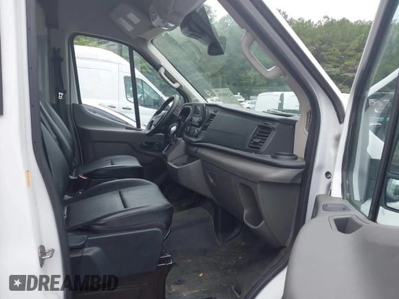 2023 Ford Transit Cargo with VIN 1FTBR1X8XPKA13479, listed as a IAAI auction lot 42608306 with 61,767 mi miles and . Bid and sale history available at DreamBid. Image 5.