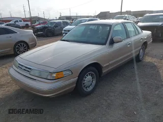 1997 Ford Crown Victoria LX с VIN 2FALP74W1VX194522, выставлен на аукционе IAAI как лот 42378930 с пробегом 113 521 миль миль и . История ставок и продаж доступна на DreamBid. Изображение 2.