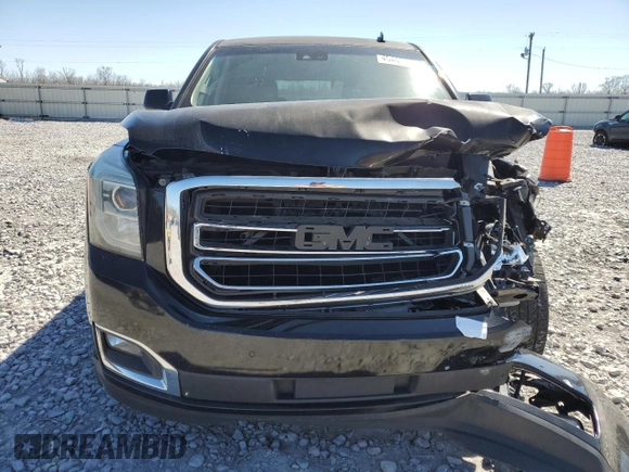 2015 GMC Yukon SLT z VIN 1GKS1BKC2FR244797, wystawiony jako Copart lot #49465995 z przebiegiem 242 448 mil mil oraz Szkoda całkowita • Salvage title. Historia ofert i sprzedaży dostępna na DreamBid. Obrazek 5.