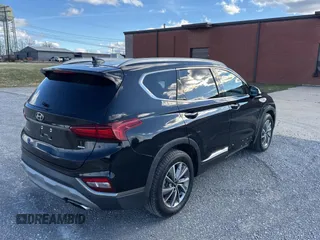 2019 Hyundai Santa Fe Ultimate with VIN 5NMS5CAD9KH008906, listed as a Copart auction lot 41676125 with 176,926 mi miles and Clean Title. Bid and sale history available at carsss.com. Image 4.