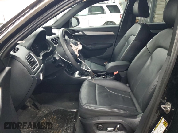 2018 Audi Q3 Premium Plus with VIN WA1JCCFS5JR018975, listed as a Copart auction lot 56663215 with 86,672 mi miles and Salvage title. Bid and sale history available at DreamBid. Image 7.