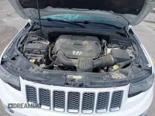 2014 Jeep Grand Cherokee Summit with VIN 1C4RJFJG0EC174871, listed as a IAAI auction lot 42341312 with 170,743 mi miles and . Bid and sale history available at DreamBid. Image 10.