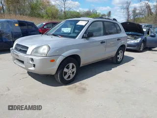 2005 Hyundai Tucson GL with VIN KM8JM12B75U075660, listed as a IAAI auction lot 42037735 with 157,453 mi miles. Bid and sale history available at carsss.com. Image 2.