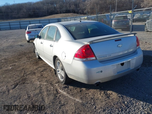 2013 Chevrolet Impala LTZ with VIN 2G1WC5E31D1190461, listed as a IAAI auction lot 41381242 with 205,833 mi miles and . Bid and sale history available at DreamBid. Image 3.