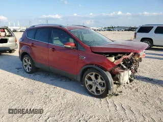 2017 Ford Escape Titanium with VIN 1FMCU0J97HUD52930, listed as a Copart auction lot 71851014 with 101,467 mi miles and Salvage Title. Bid and sale history available at carsss.com. Image 4.