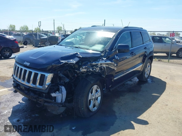 2012 Jeep Grand Cherokee Laredo with VIN 1C4RJFAG0CC160255, listed as a IAAI auction lot 41967809 with 127,702 mi miles. Bid and sale history available at carsss.com. Image 2.