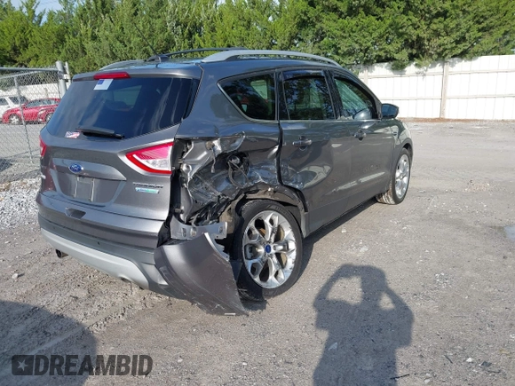 2013 Ford Escape Titanium with VIN 1FMCU0J96DUC31879, listed as a IAAI auction lot 42637019 with 66,096 mi miles and . Bid and sale history available at DreamBid. Image 4.