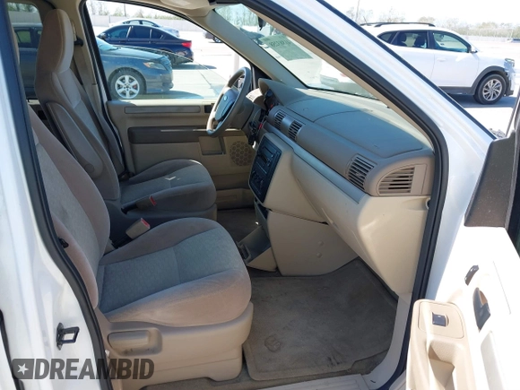 2006 Ford Freestar SE z VIN 2FMZA51686BA57540, wystawiony jako IAAI lot #41883258 z przebiegiem 38 590 mil mil oraz . Historia ofert i sprzedaży dostępna na DreamBid. Obrazek 5.
