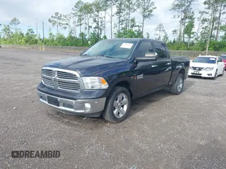 2015 Ram 1500 Big Horn z VIN 1C6RR7TM8FS711048, wystawiony jako IAAI lot #41760186 z przebiegiem Nie podano mil oraz . Historia ofert i sprzedaży dostępna na DreamBid. Obrazek 19.
