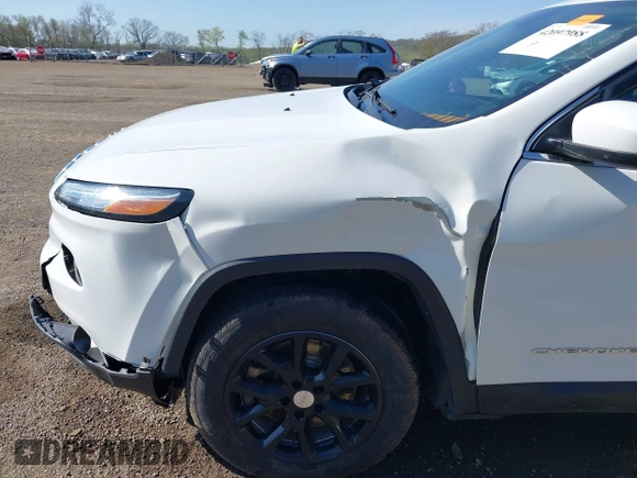 2015 Jeep Cherokee Latitude with VIN 1C4PJMCS0FW790017, listed as a IAAI auction lot 42097988 with 105,990 mi miles and . Bid and sale history available at DreamBid. Image 17.