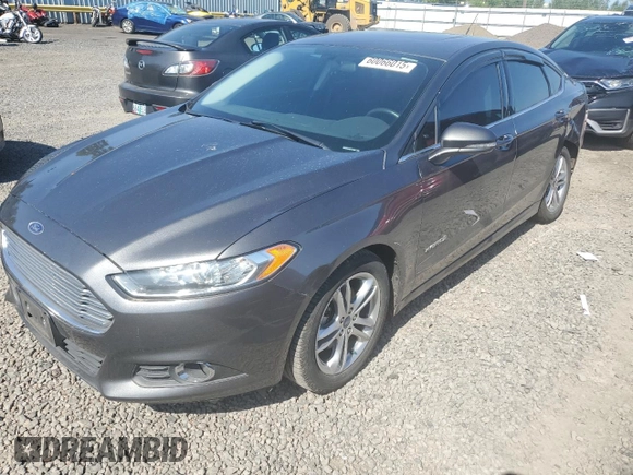 2016 Ford Fusion SE Hybrid z VIN 3FA6P0LU3GR173886, wystawiony jako Copart lot #60066015 z przebiegiem 140 328 mil mil oraz Szkoda całkowita • Salvage title. Historia ofert i sprzedaży dostępna na DreamBid. Obrazek 1.