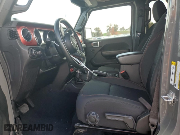 2020 Jeep Wrangler Unlimited Rubicon with VIN 1C4HJXFN9LW156972, listed as a Copart auction lot 50666195 with 13,834 mi miles and Salvage title. Bid and sale history available at DreamBid. Image 7.
