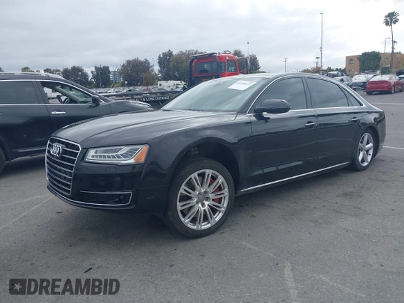 2015 Audi A8 L 4.0T with VIN WAU32AFD4FN033471, listed as a IAAI auction lot 42120112 with 174,882 mi miles. Bid and sale history available at carsss.com. Image 17.