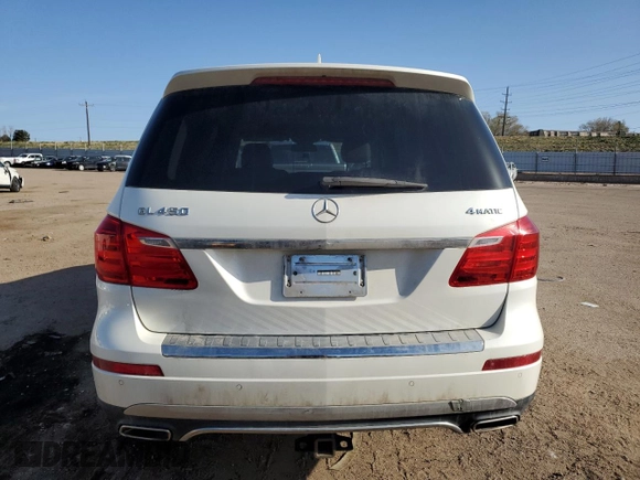 2014 Mercedes-Benz GL 450 z VIN 4JGDF7CE0EA395164, wystawiony jako Copart lot #51081185 z przebiegiem 92 321 mil mil oraz Szkody całkowita. Historia ofert i sprzedaży dostępna na DreamBid. Obrazek 6.