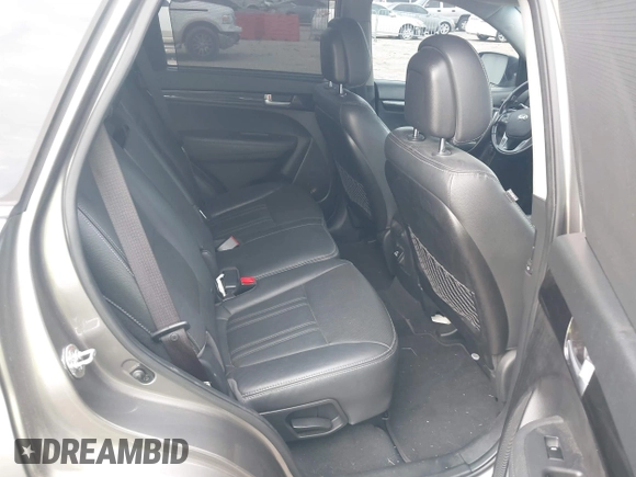2014 Kia Sorento SX Limited with VIN 5XYKW4A73EG503792, listed as a IAAI auction lot 42684390 with 129,021 mi miles and . Bid and sale history available at DreamBid. Image 8.