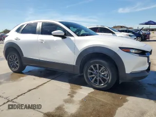 2020 Mazda CX-30 with VIN 3MVDMABLXLM127549, listed as a Copart auction lot 79727114 with 71,311 mi miles and Clean Title. Bid and sale history available at DreamBid. Image 4.