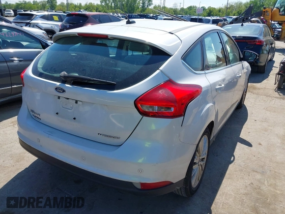 2018 Ford Focus Titanium with VIN 1FADP3N24JL279449, listed as a IAAI auction lot 42297780 with 144,479 mi miles and . Bid and sale history available at DreamBid. Image 4.