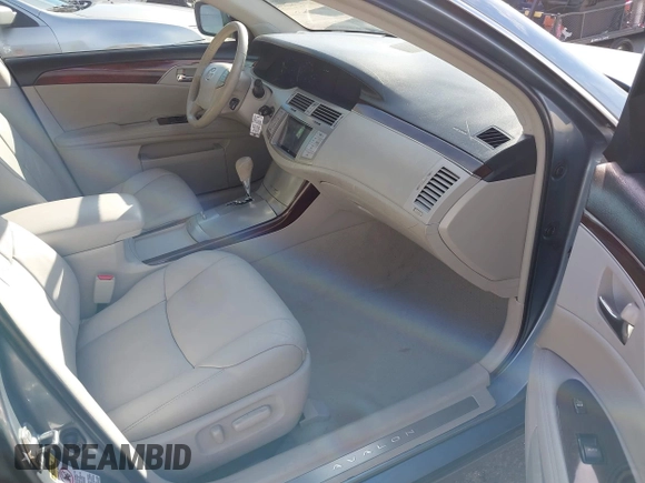 2009 Toyota Avalon XL with VIN 4T1BK36B19U350297, listed as a IAAI auction lot 41589714 with 141,003 mi miles. Bid and sale history available at carsss.com. Image 5.