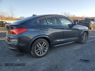 2016 BMW X4 xDrive28i z VIN 5UXXW3C58G0M90492, wystawiony jako Copart lot #87219454 z przebiegiem 129 335 mil mil oraz Szkoda całkowita • Salvage title. Historia ofert i sprzedaży dostępna na DreamBid. Obrazek 3.