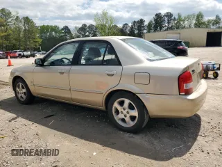 2001 Mazda Protege LX with VIN JM1BJ225810473897, listed as a Copart auction lot 52192045 with 145,839 mi miles and Salvage Title. Bid and sale history available at carsss.com. Image 2.