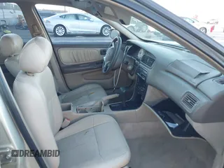 1999 Nissan Altima XE with VIN 1N4DL01D1XC266457, listed as a IAAI auction lot 41378353 with 253,520 mi miles. Bid and sale history available at carsss.com. Image 5.