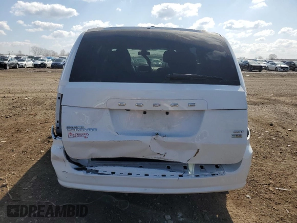 2019 Dodge Grand Caravan SXT with VIN 2C4RDGCG7KR663085, listed as a Copart auction lot 52530605 with 64,590 mi miles and Salvage Title. Bid and sale history available at DreamBid. Image 6.