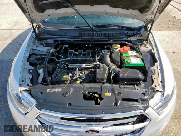 2013 Ford Taurus Limited with VIN 1FAHP2F84DG129904, listed as a Copart auction lot 58218205 with 105,877 mi miles and Salvage title. Bid and sale history available at DreamBid. Image 11.