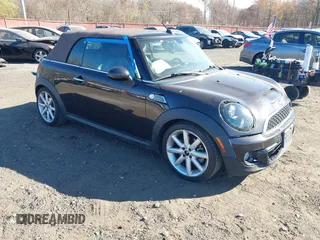 2013 MINI Convertible S with VIN WMWZP3C56DT705074, listed as a IAAI auction lot 40762024 with 57,685 mi miles and . Bid and sale history available at DreamBid. Image 1.