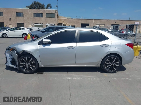 2019 Toyota Corolla L with VIN 5YFBURHE5KP877691, listed as a IAAI auction lot 42108591 with 85,813 mi miles and . Bid and sale history available at DreamBid. Image 14.