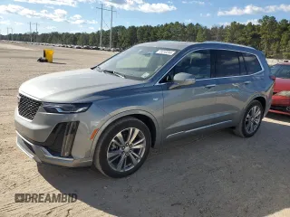 2023 Cadillac XT6 FWD Premium Luxury with VIN 1GYKPCRS0PZ231233, listed as a Copart auction lot 73210244 with 14,604 mi miles and Salvage Title. Bid and sale history available at carsss.com. Image 1.