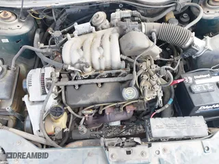 1997 Ford Taurus GL with VIN 1FALP52U8VA147714, listed as a IAAI auction lot 40781743 with 57,823 mi miles. Bid and sale history available at carsss.com. Image 10.