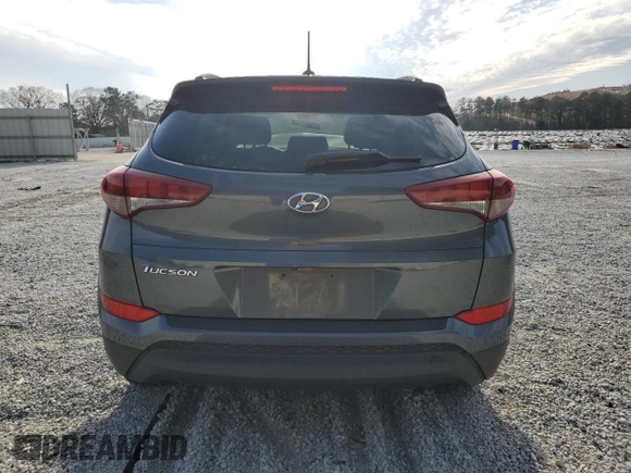 2017 Hyundai Tucson SE with VIN KM8J33A42HU544398, listed as a Copart auction lot 47004675 with 74,561 mi miles and Salvage Title. Bid and sale history available at DreamBid. Image 6.