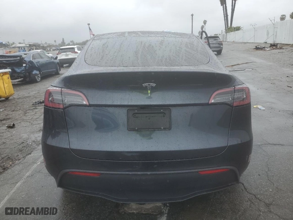 2024 Tesla Model Y with VIN 7SAYGDED5RF054851, listed as a Copart auction lot 42835055 with 14,695 mi miles and Salvage Title. Bid and sale history available at carsss.com. Image 6.