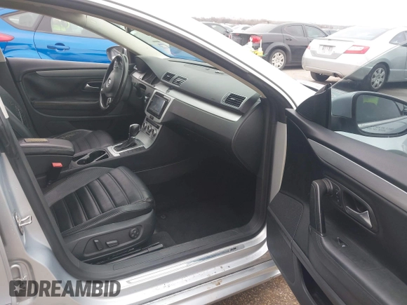 2014 Volkswagen CC Sport with VIN WVWBN7ANXEE501758, listed as a IAAI auction lot 41443518 with 193,259 mi miles and . Bid and sale history available at DreamBid. Image 5.
